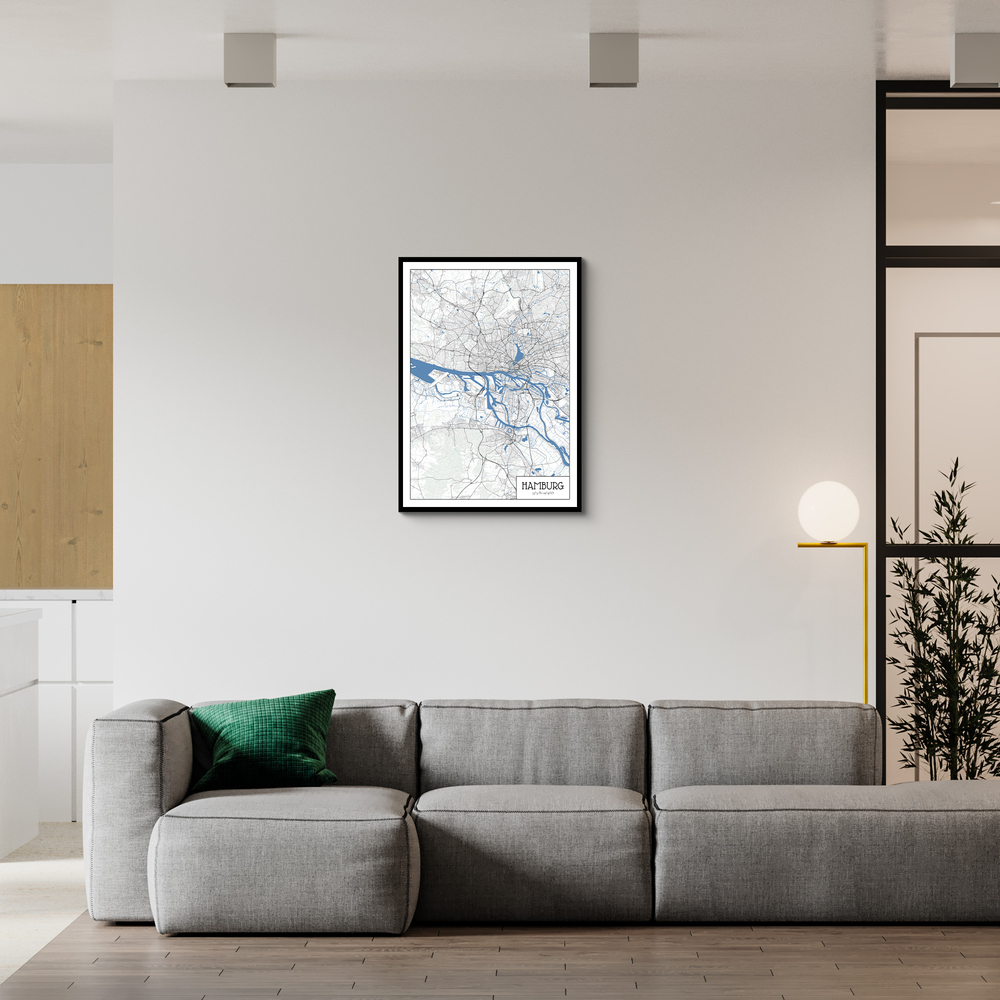 Mappa di Amburgo in stile architettonico con cornice nera, sopra un divano grigio in un soggiorno moderno